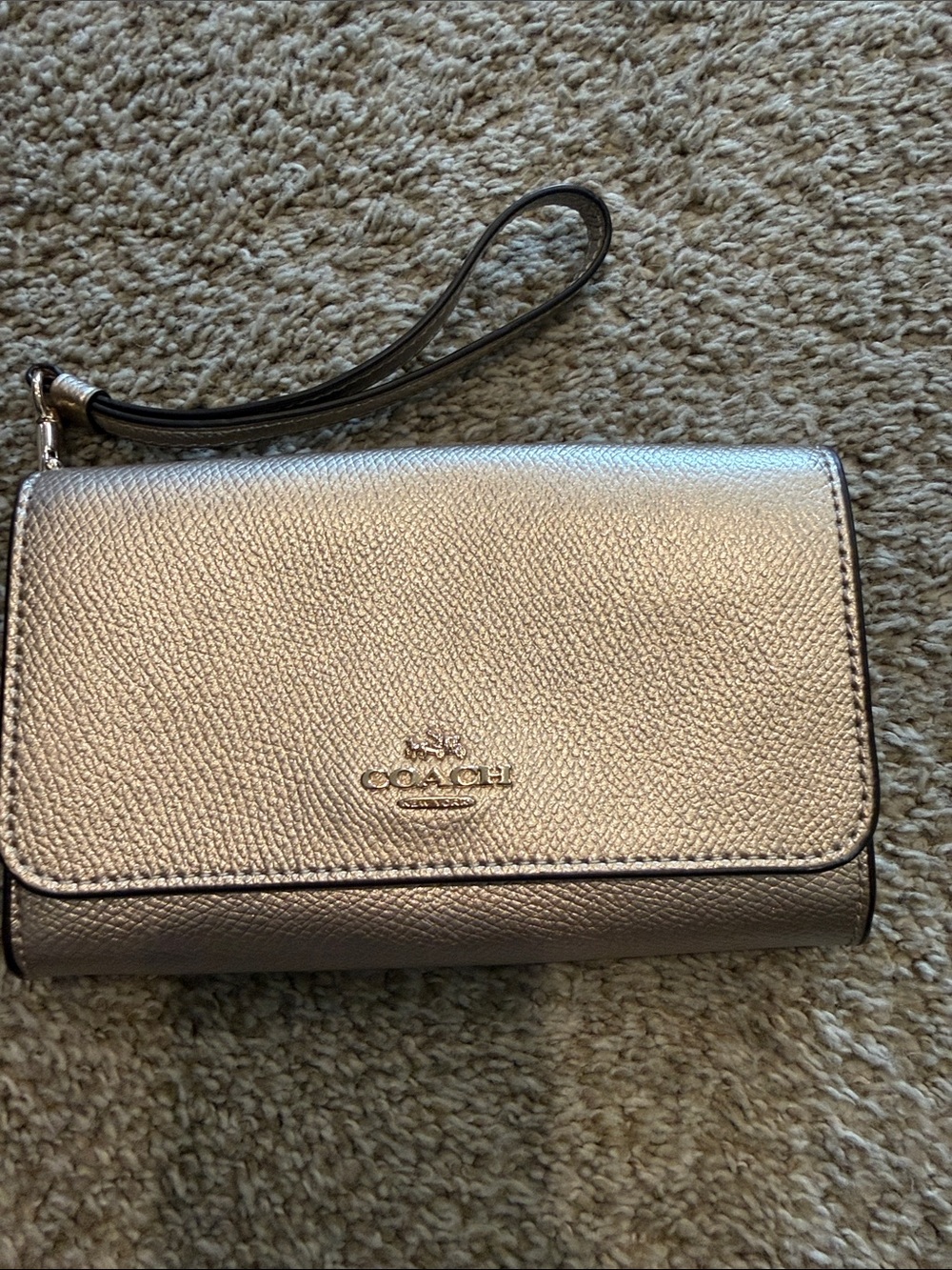 Coach Metallic  rose gold Pebbled Leather Wristlet Clutch